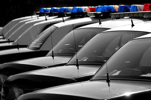 Row of Police Cars with Blue and Red Lights Wall Mural Wallpaper - Canvas Art Rocks - 1