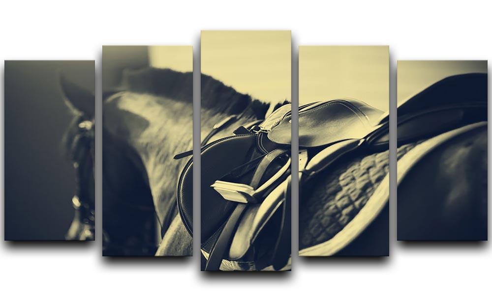Saddle with stirrups on a back of a sport horse 5 Split Panel Canvas - Canvas Art Rocks - 1