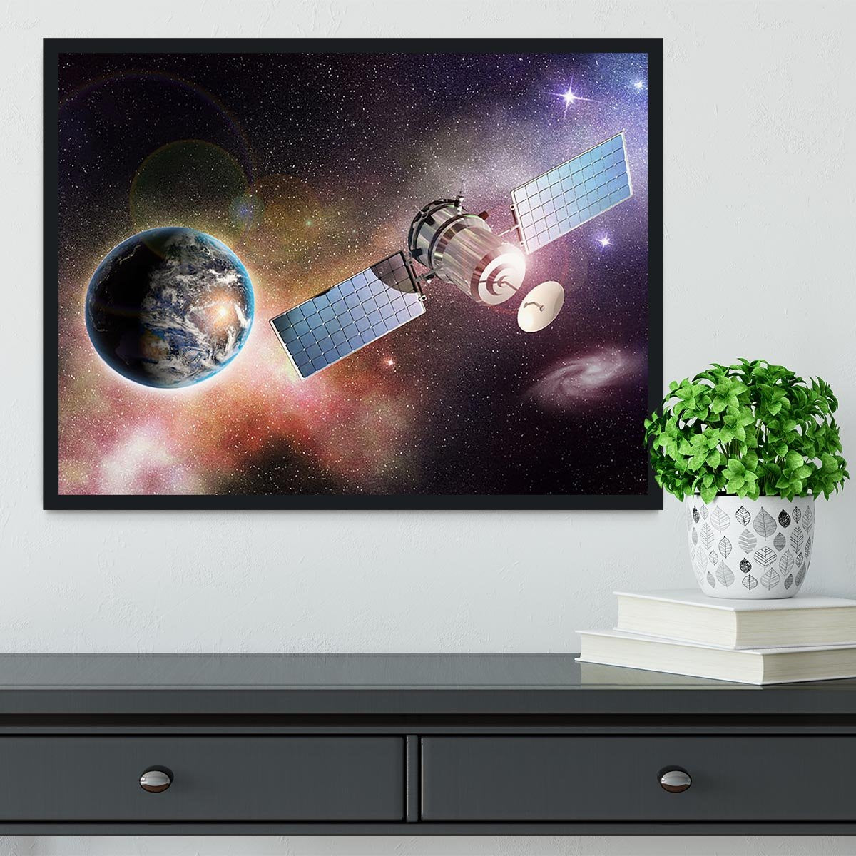 Satellite orbiting the earth in the outer space Framed Print - Canvas Art Rocks - 2