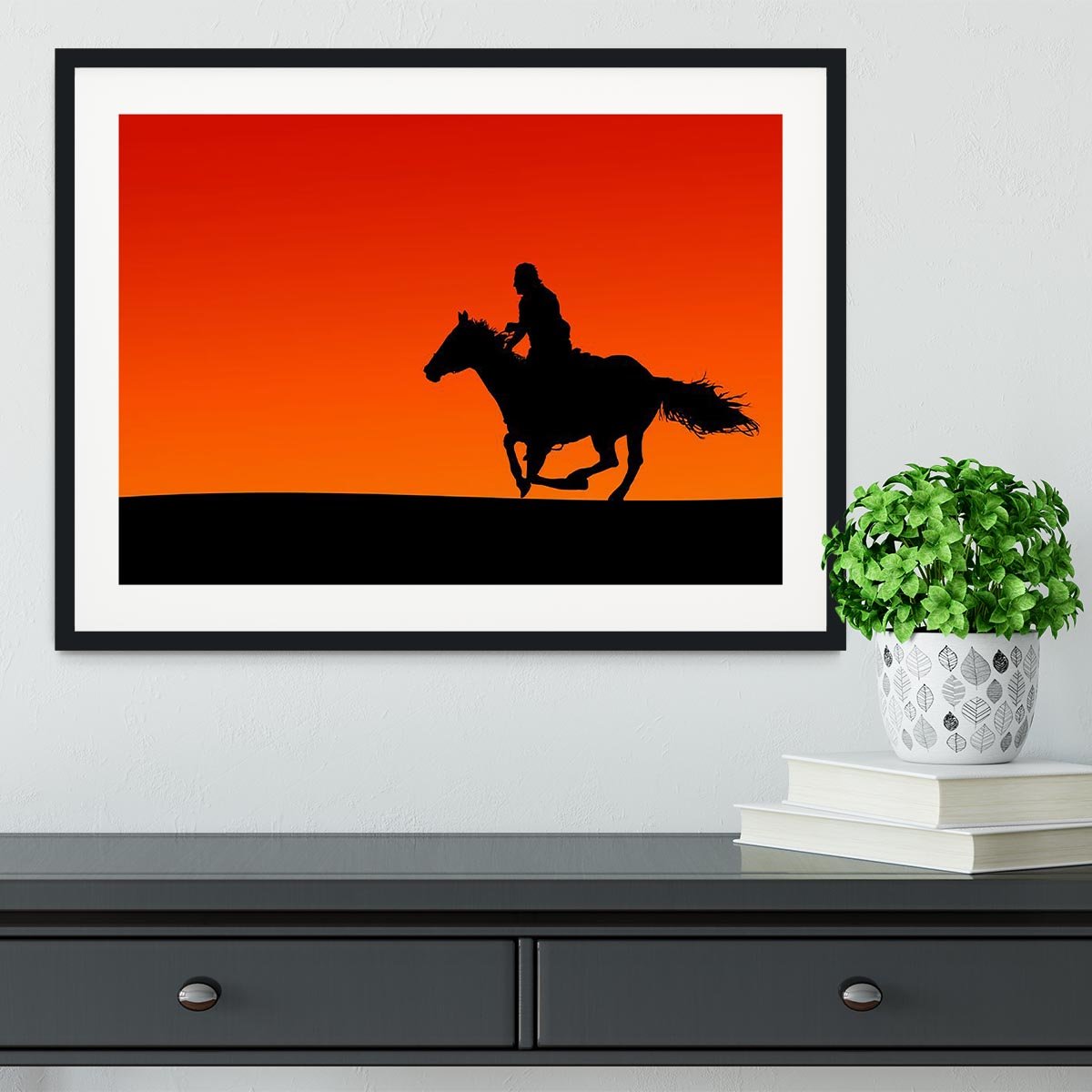Silhouette of a horse and rider at sunset Framed Print - Canvas Art Rocks - 1