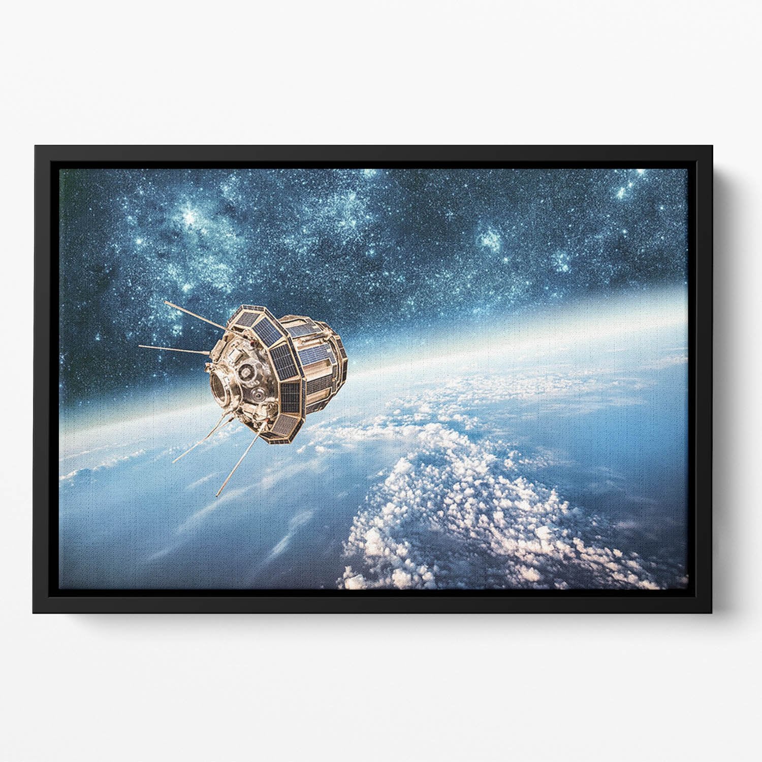 Space satellite orbiting Floating Framed Canvas