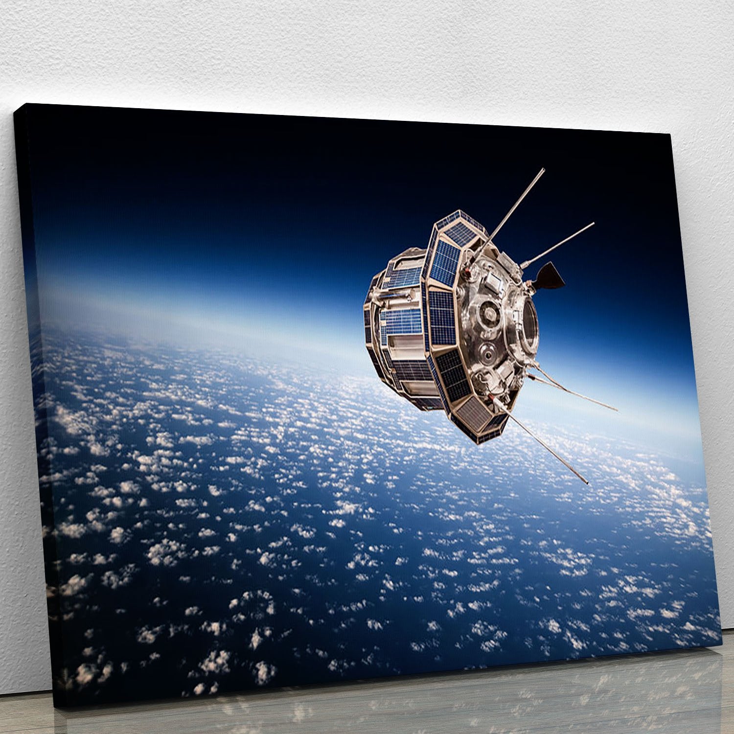 Space satellite orbiting the earth Canvas Print or Poster