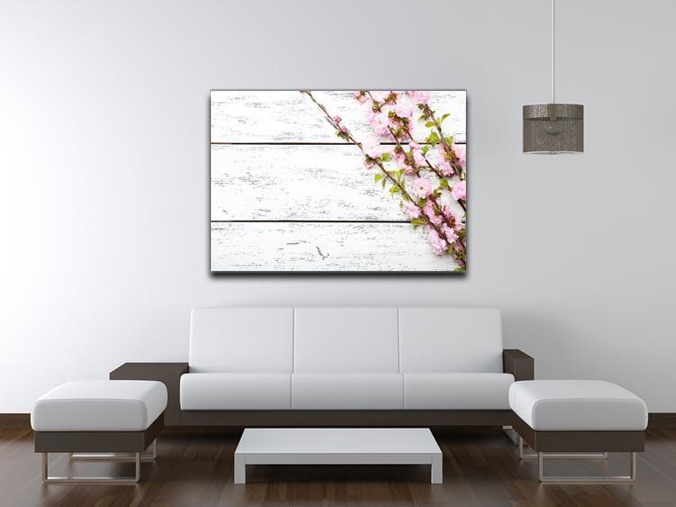Spring flowering branch on white wooden Canvas Print or Poster - Canvas Art Rocks - 4