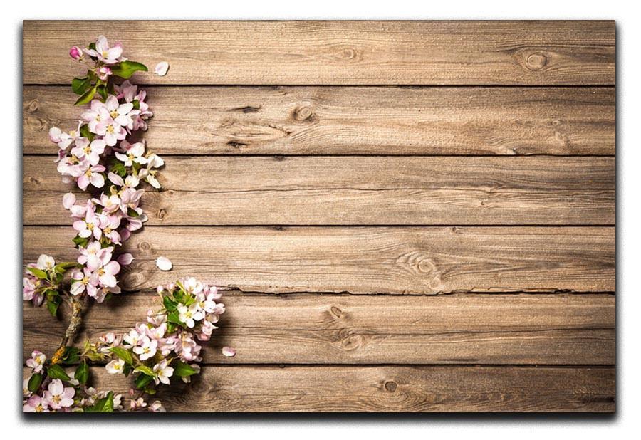 Spring flowering branch on wooden background Canvas Print or Poster  - Canvas Art Rocks - 1
