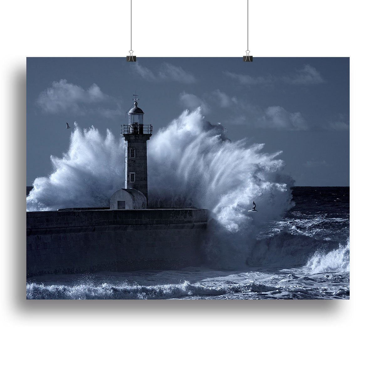 Stormy waves over old lighthouse Canvas Print or Poster
