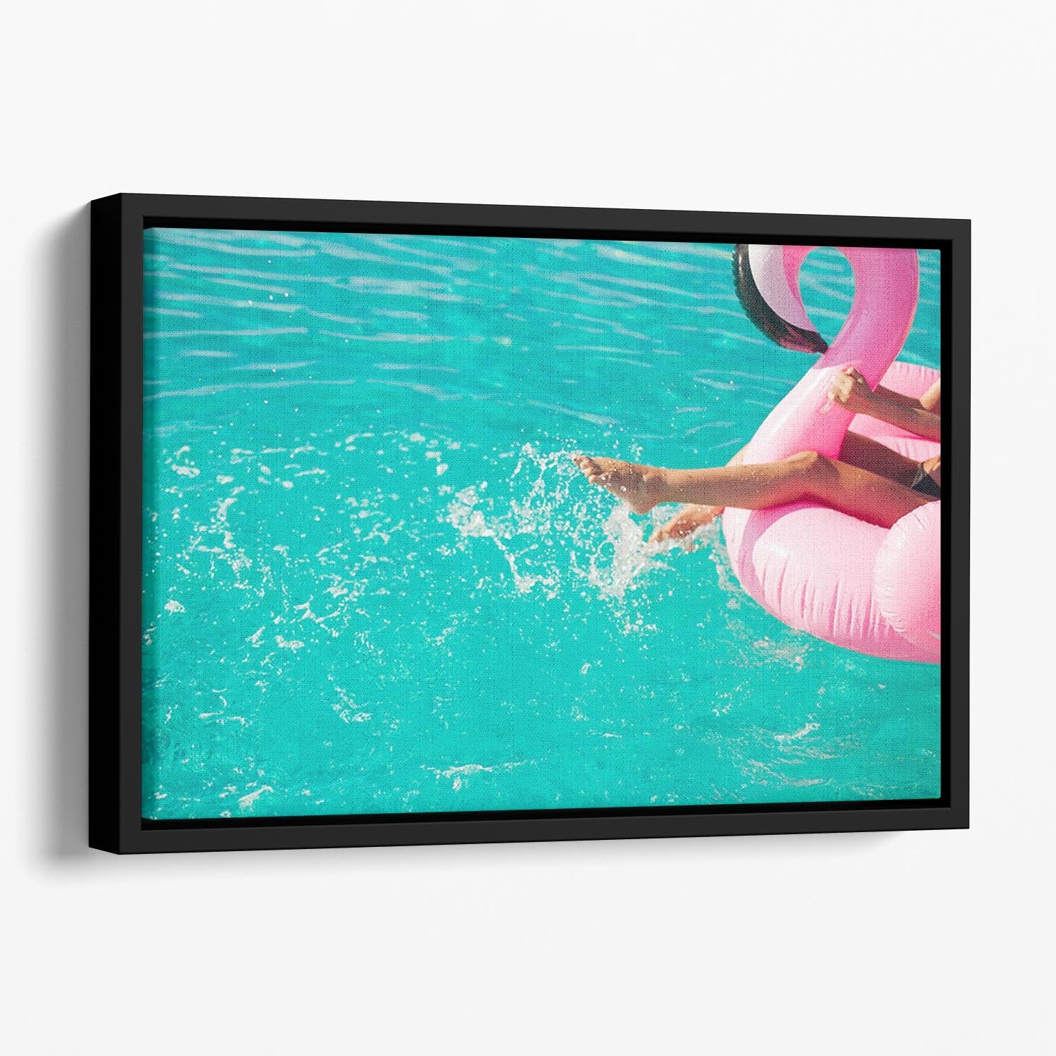 Tan girl sits on inflatable mattress flamingos in the pool Floating Framed Canvas - Canvas Art Rocks - 1