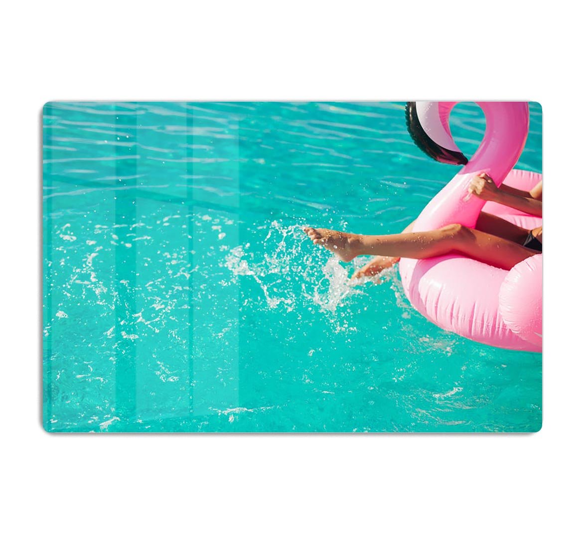 Tan girl sits on inflatable mattress flamingos in the pool HD Metal Print - Canvas Art Rocks - 1