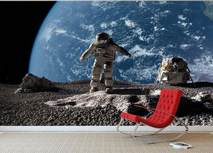 The astronaut on a background of a planet Wall Mural Wallpaper - Canvas Art Rocks - 2