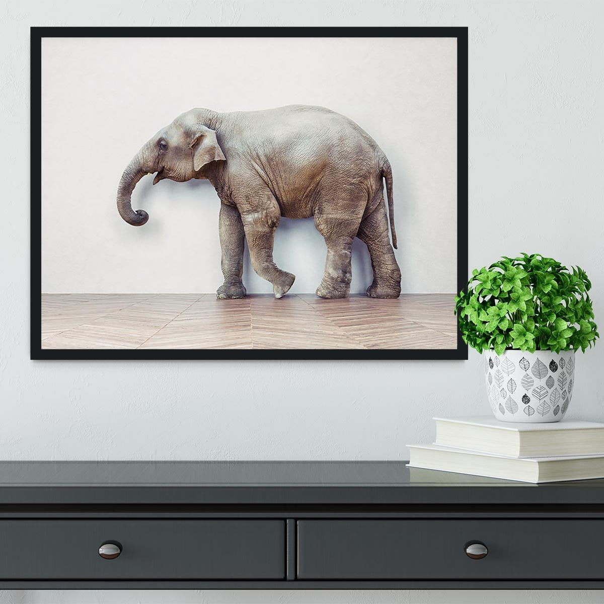 The elephant calm in the room near white wall Framed Print - Canvas Art Rocks - 2