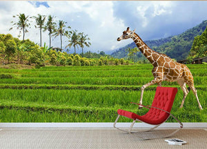 The giraffe goes on a green grass against mountains Wall Mural Wallpaper - Canvas Art Rocks - 2
