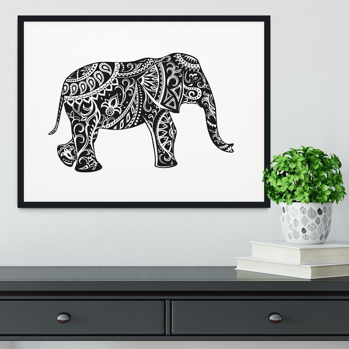The stylized figure of an elephant in the festive patterns Framed Print - Canvas Art Rocks - 1