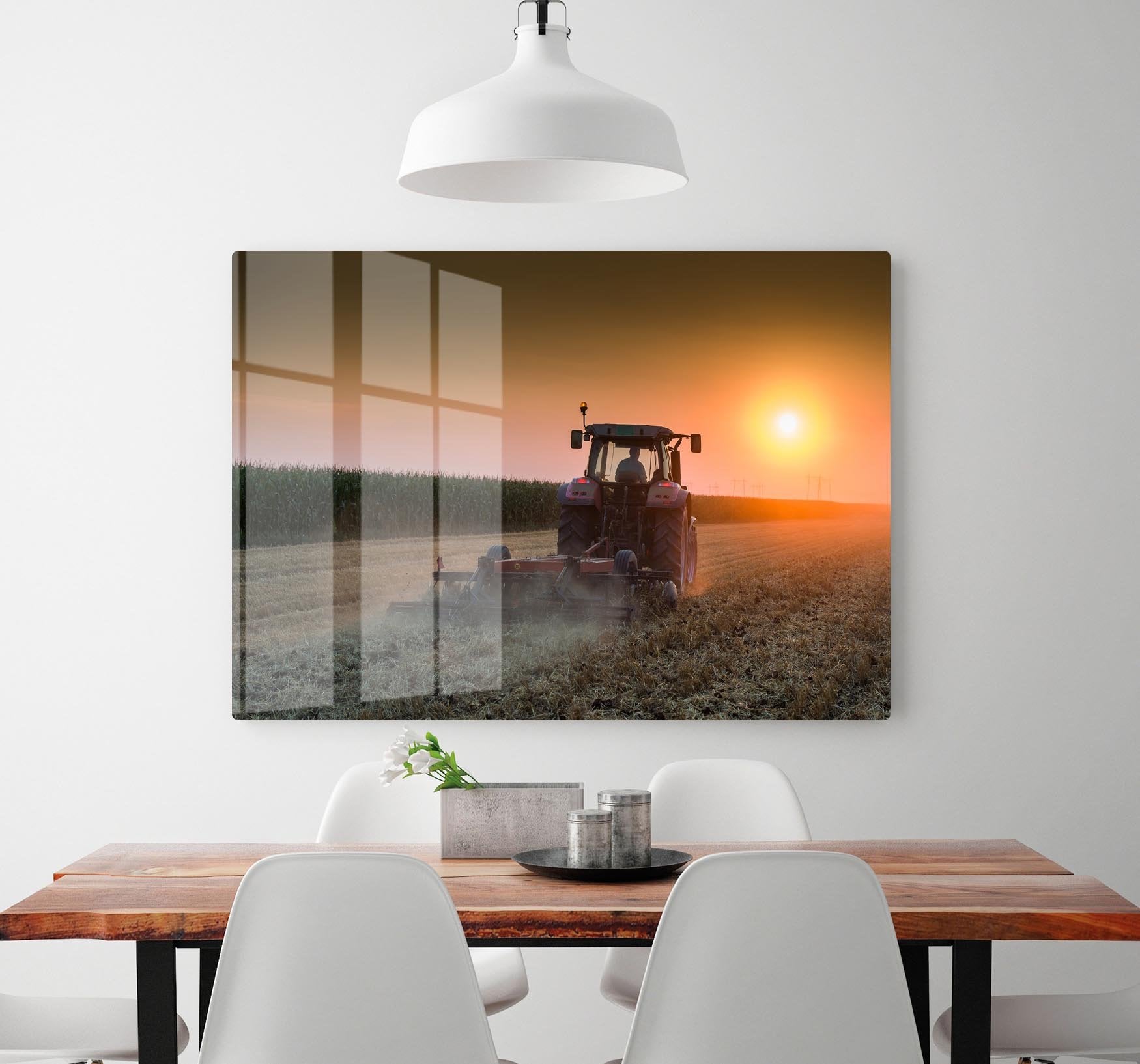 Tractor plowing field at dusk HD Metal Print