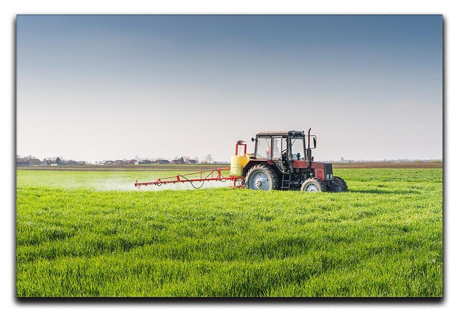 Tractor spraying wheat field Canvas Print or Poster  - Canvas Art Rocks - 1