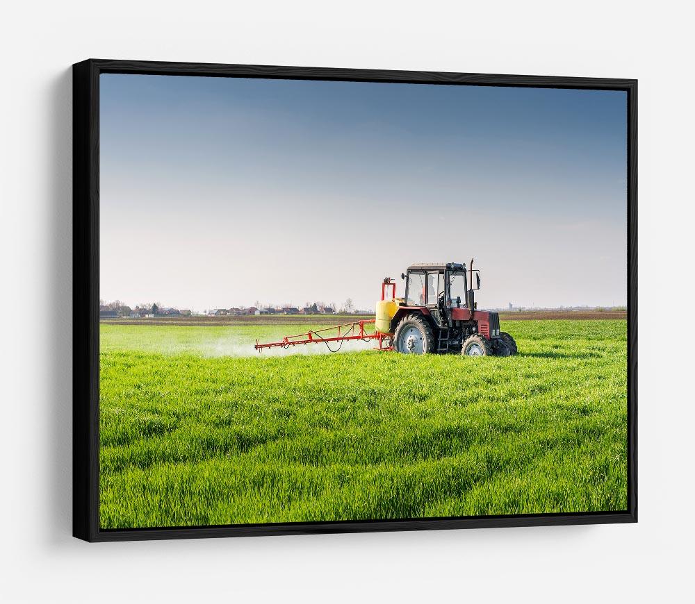 Tractor spraying wheat field HD Metal Print