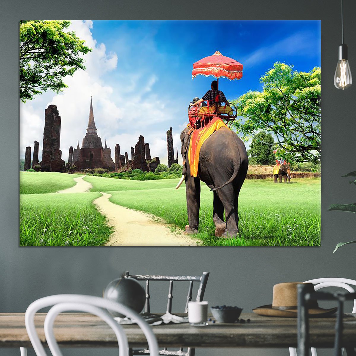 Travel concept tourists on an elephant Canvas Print or Poster