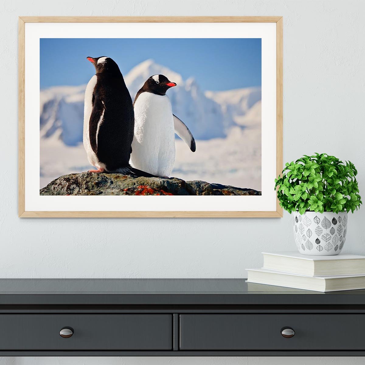 Two penguins dreaming sitting on a rock Framed Print - Canvas Art Rocks - 3