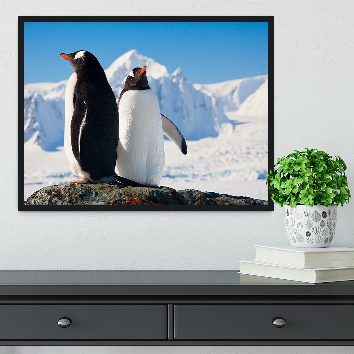 Two penguins dreaming together sitting on a rock Framed Print - Canvas Art Rocks - 2