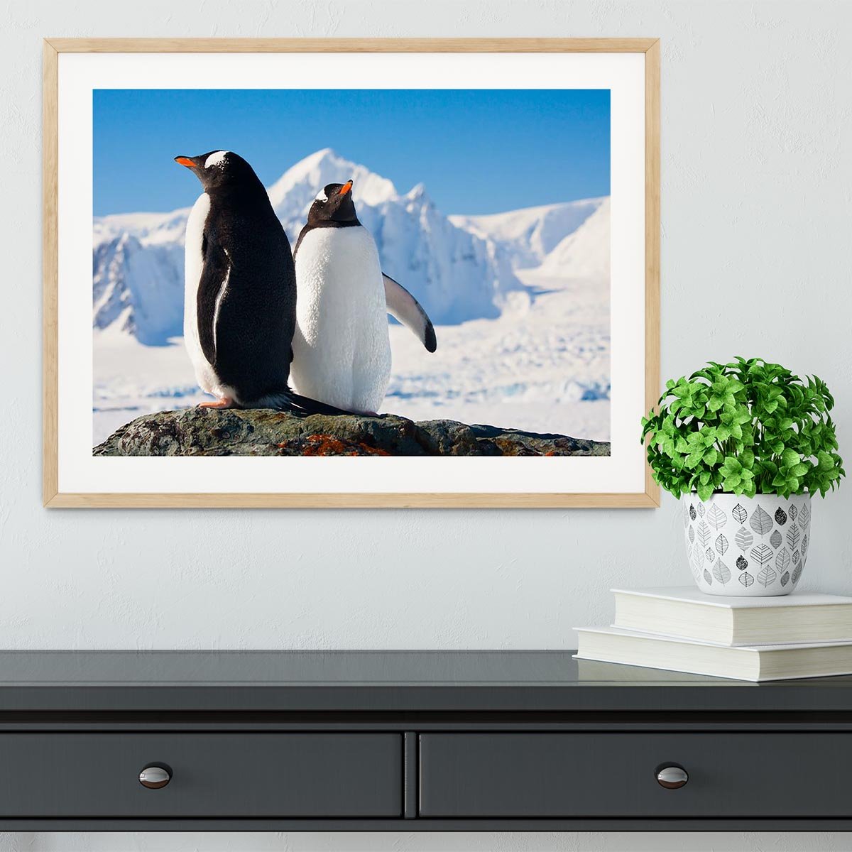 Two penguins dreaming together sitting on a rock Framed Print - Canvas Art Rocks - 3