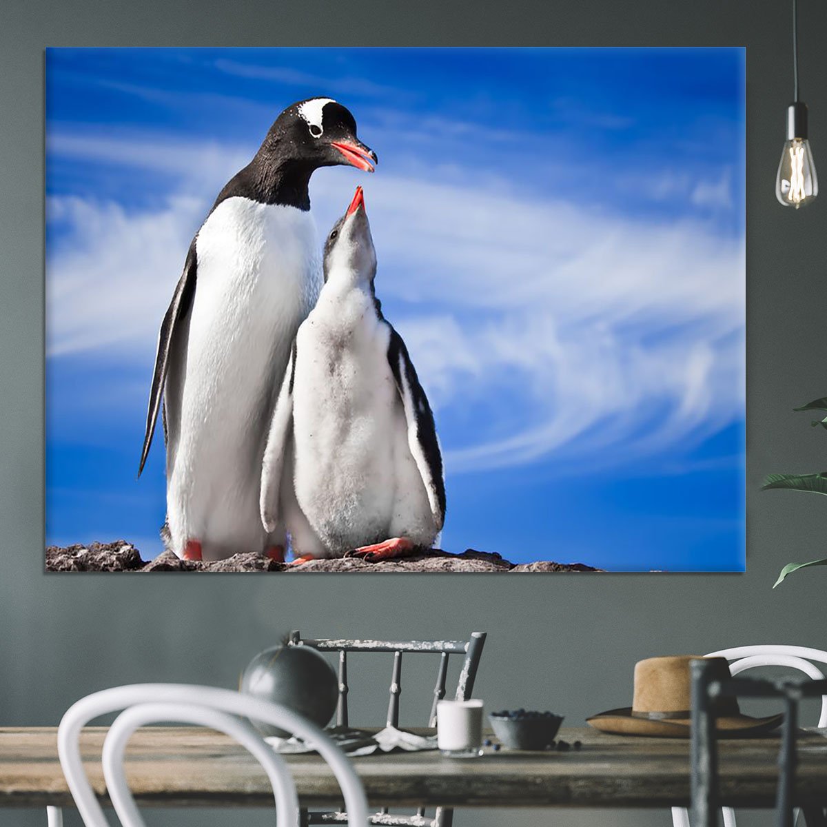 Two penguins resting Canvas Print or Poster