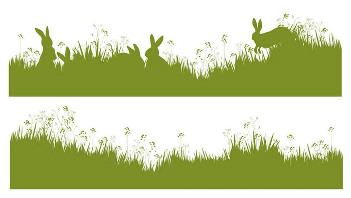 Vector silhouette rabbits in grass background Wall Mural Wallpaper