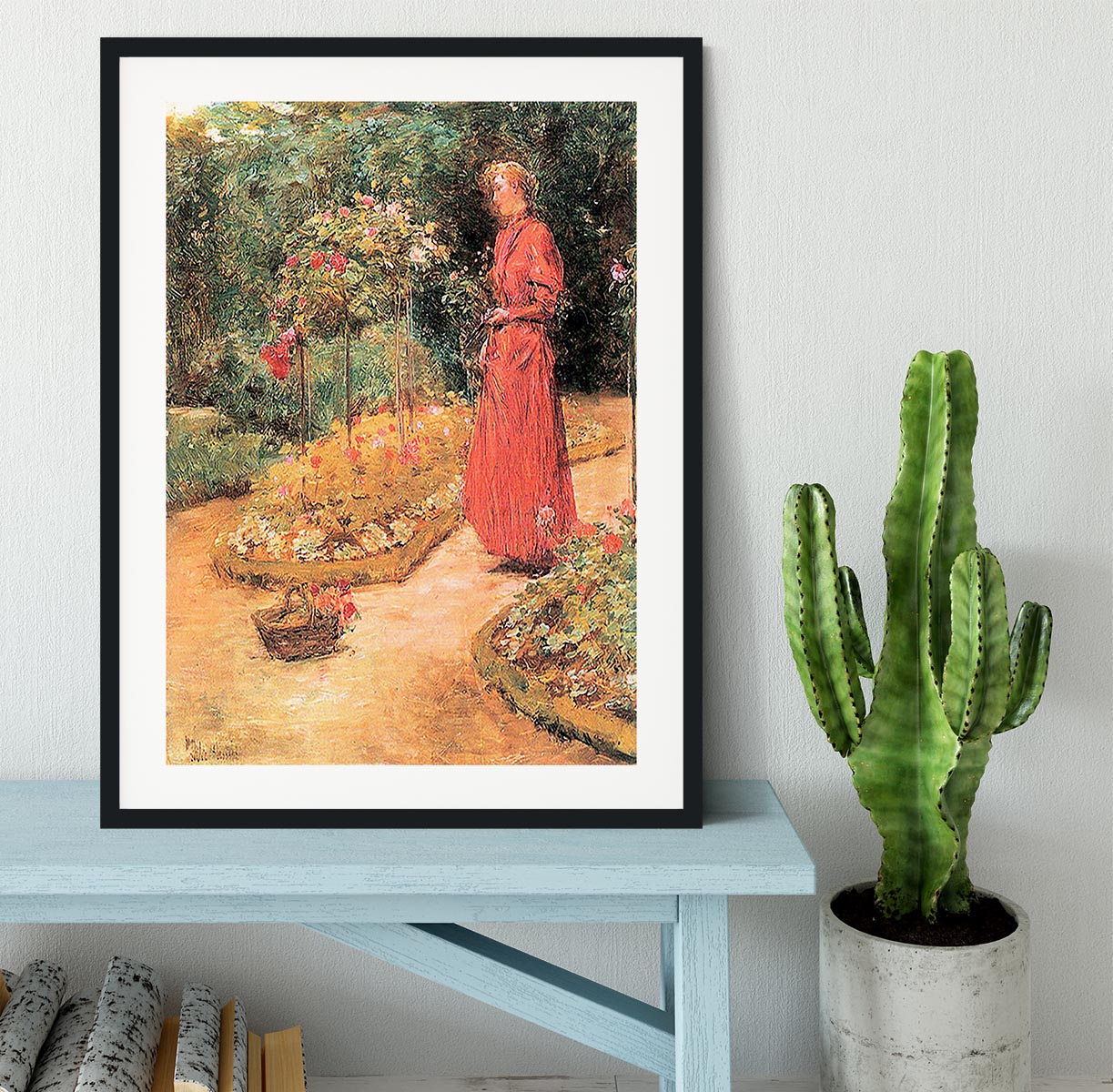 Woman cuts roses in a garden by Hassam Framed Print - Canvas Art Rocks - 1