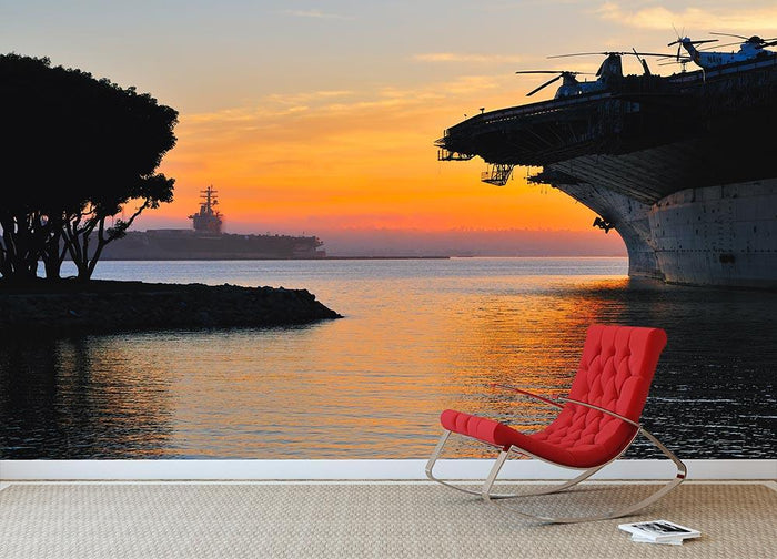 aircraft carrier in harbour in sunset Wall Mural Wallpaper