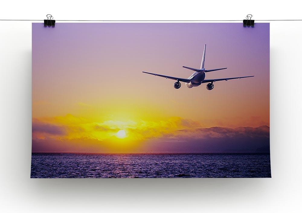 airplane in the sky over ocean Canvas Print or Poster - Canvas Art Rocks - 2