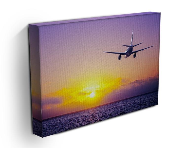 airplane in the sky over ocean Canvas Print or Poster - Canvas Art Rocks - 3
