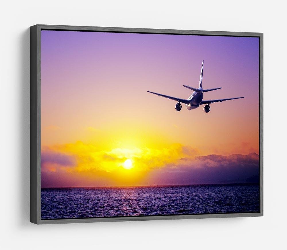 airplane in the sky over ocean HD Metal Print