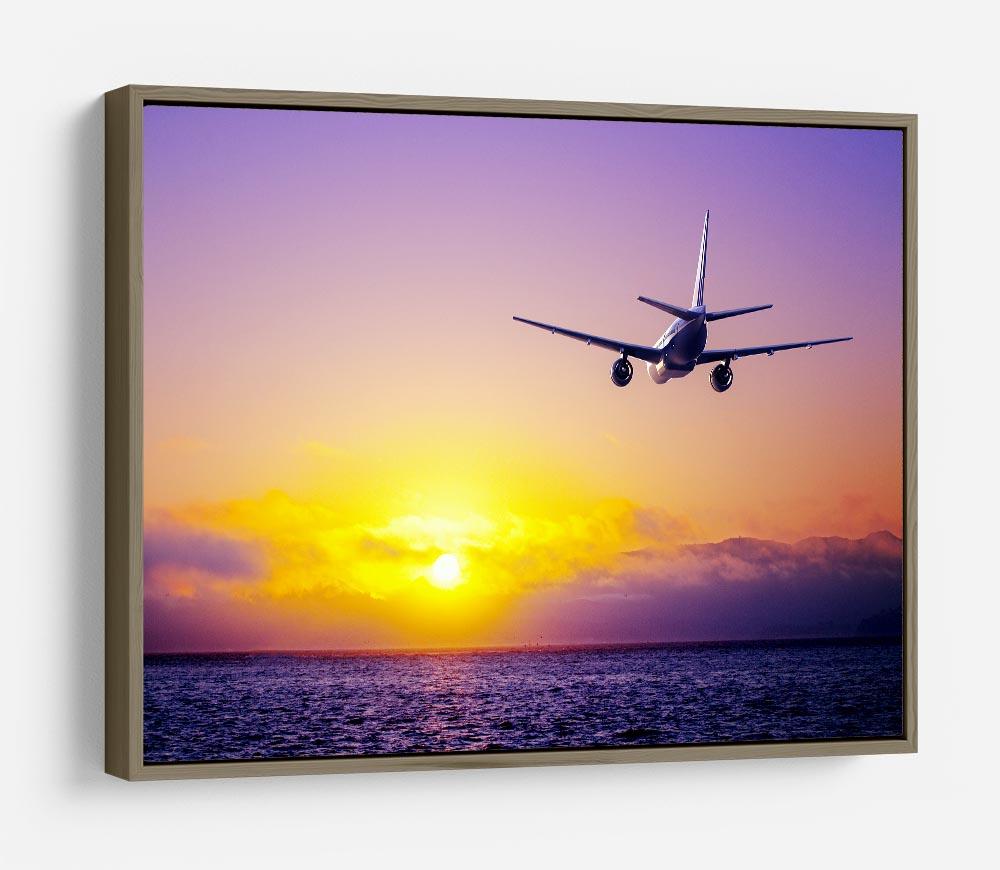 airplane in the sky over ocean HD Metal Print