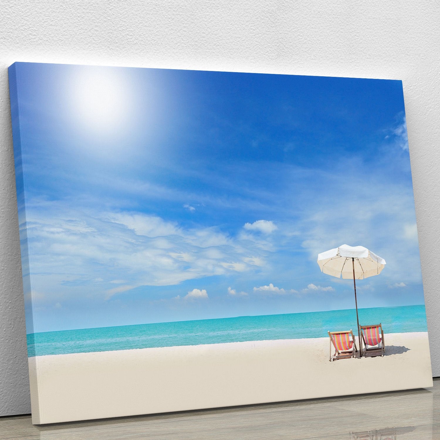 beach with cloudy blue sky Canvas Print or Poster