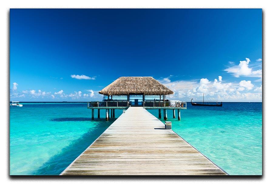 beach with jetty at Maldives Canvas Print or Poster - Canvas Art Rocks - 1