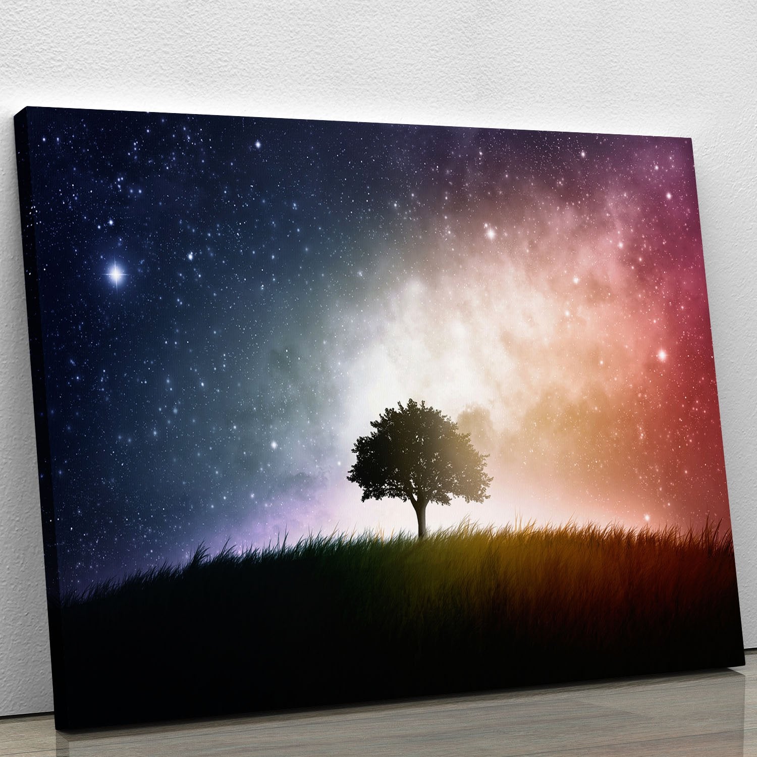 tree in a field with beautiful space background Canvas Print or Poster