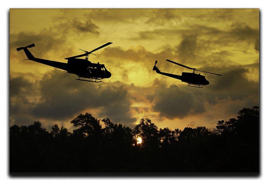 two helicopters flying over South Vietnam Canvas Print or Poster  - Canvas Art Rocks - 1